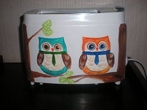 Hand painted toaster. In fun owls perched on their trees. 2 boys and 2 girls.